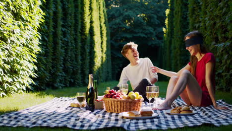 couple enjoying a picnic in a garden
