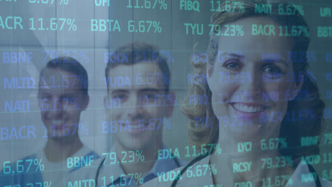 animation of stock market data processing over team of male and female health workers smiling