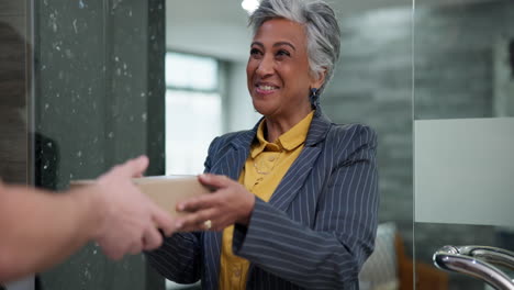 businesswoman receiving a package