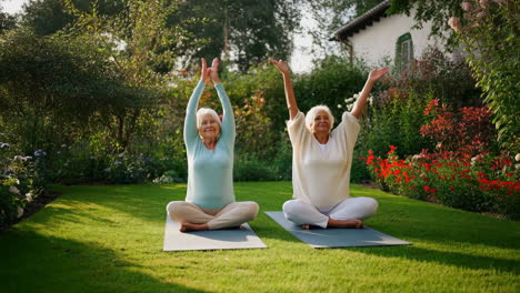 senior women practicing yoga in a peaceful garden