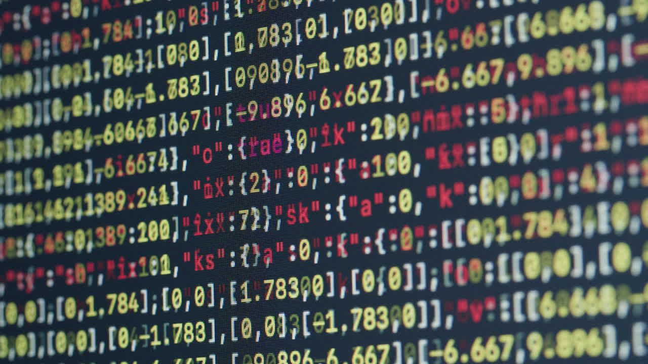 Close-up view of computer code on a monitor.