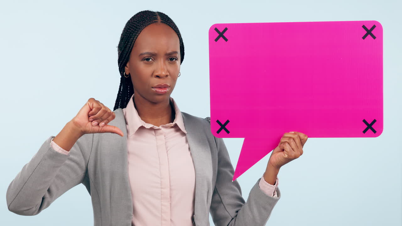 Thumbs down, speech bubble