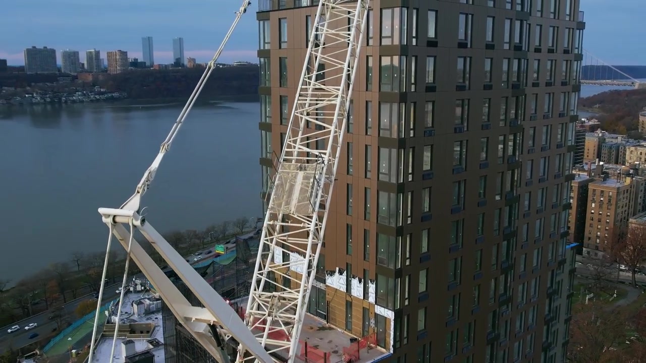 Advanced luffing jib construction tower crane Flushing NewYork aerial