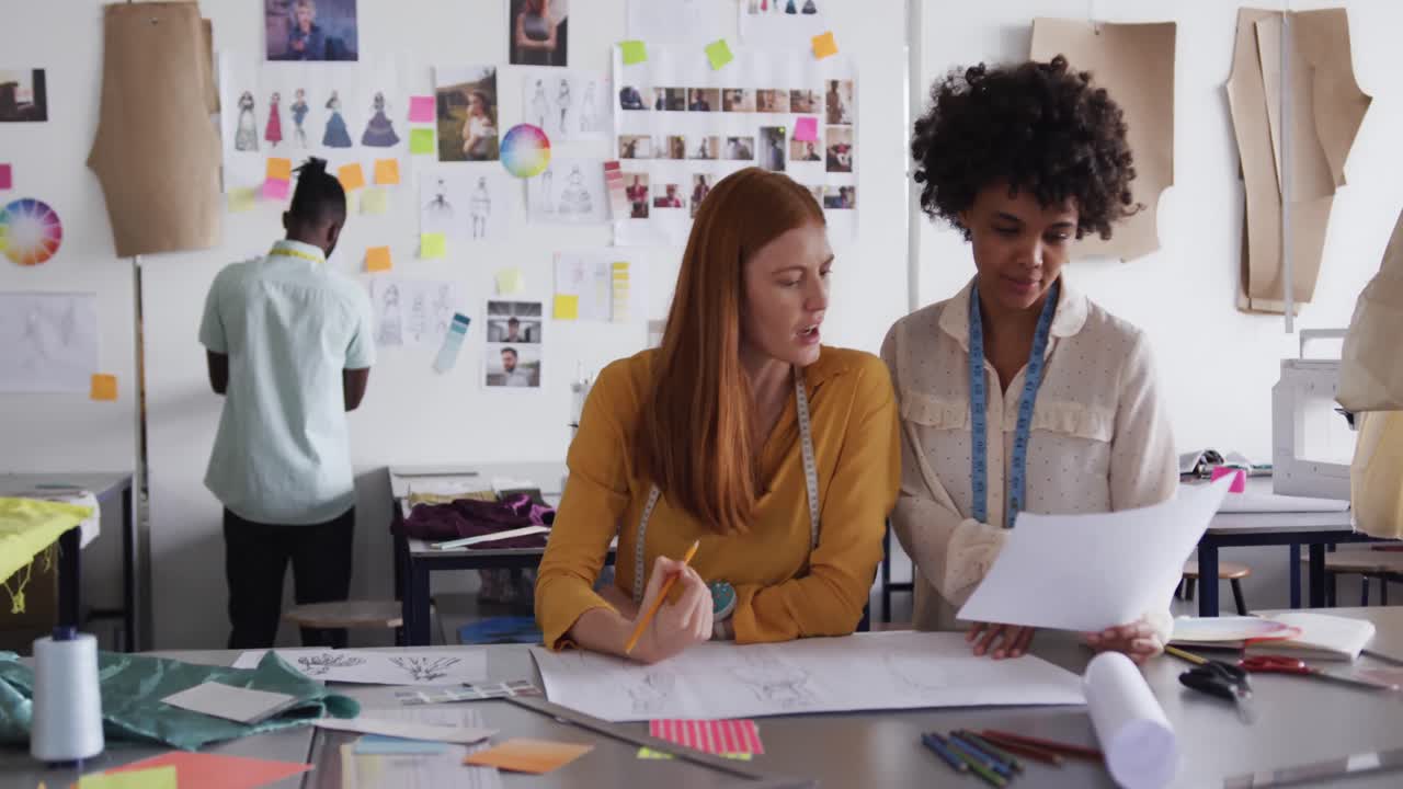 Two women working in fashion office