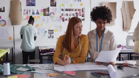 two women working in fashion office