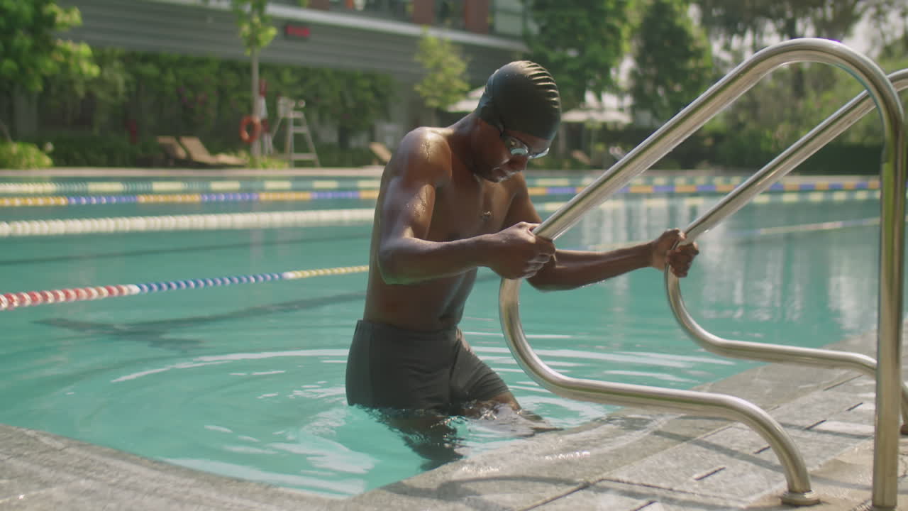 Swimmer Entering Outdoor Pool