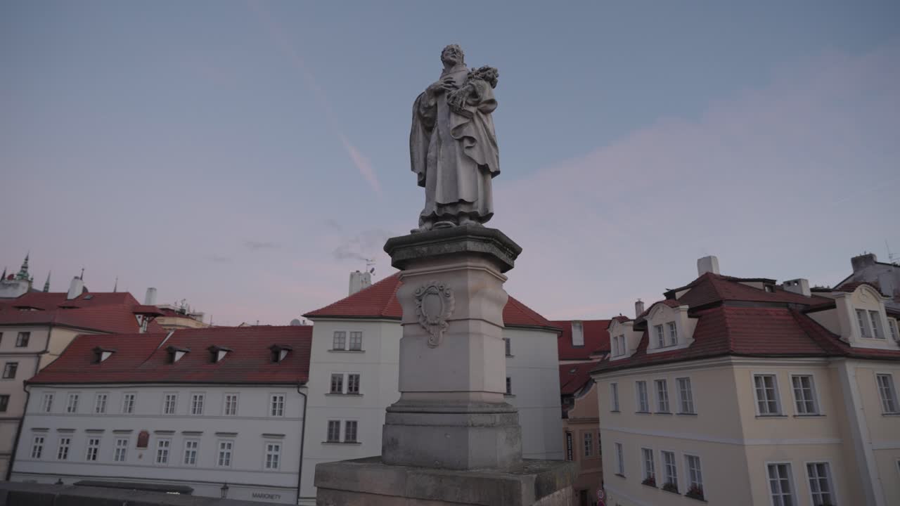 Statue in a Cityscape