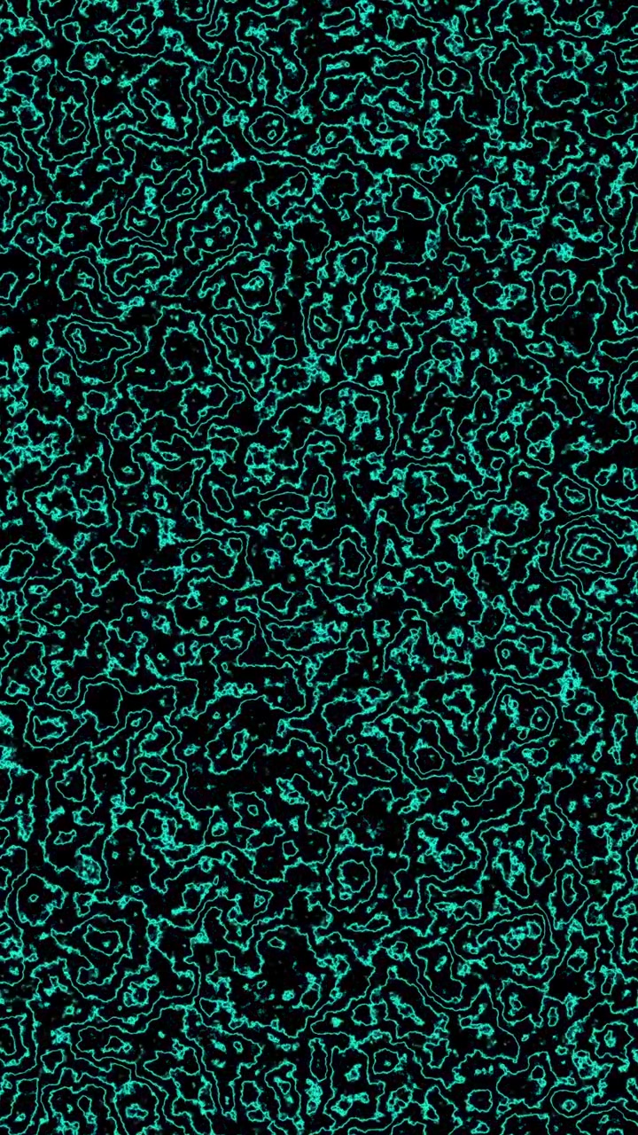Vertical video of a dense abstract glowing cyan plasma texture moving on black background.