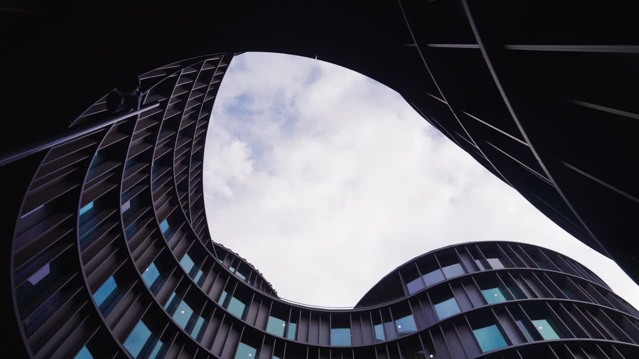 Impressive view of futuristic building oval and spiral exterior, Denmark