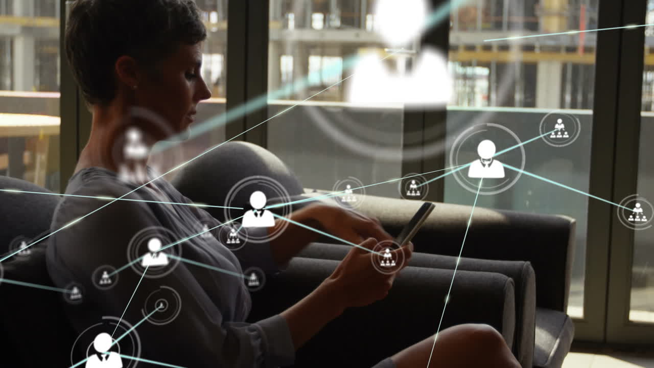 Animation of network of connections with icons over caucasian woman using smartphone