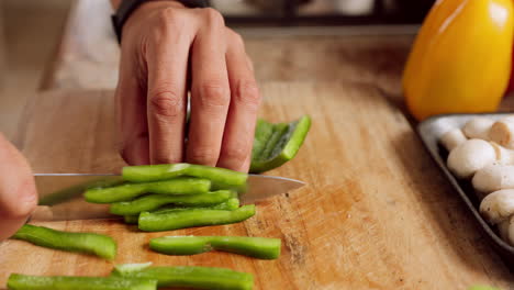 chef in kitchen, with knife