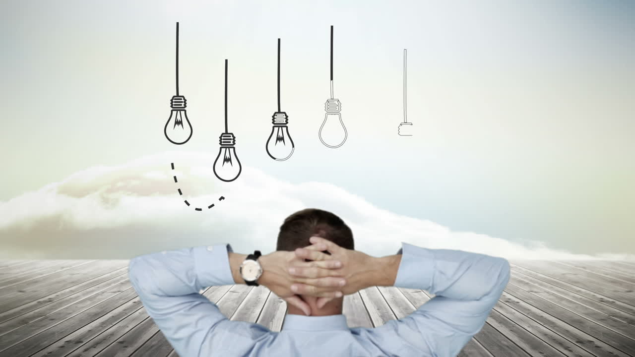 전구 가 나타나는 것 을 지켜보는 사업가