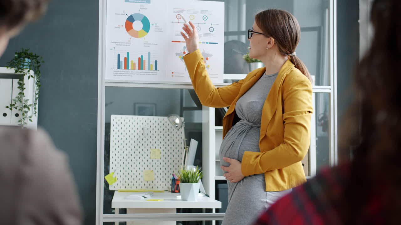 Pregnant Businesswoman Giving a Presentation