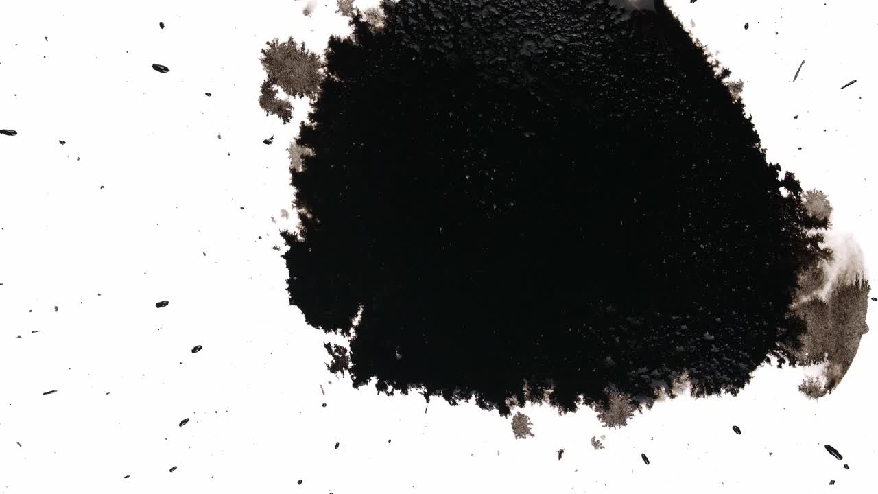 Black Ink Drops On White Background