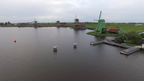 aerial rural scene with windmills in netherlands