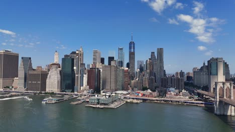 aerial view of nyc skyline with water in the foreground an expansive aerial view showcasing the iconic new york city skyline complemented by a serene body of water that lies gracefully in the foreground