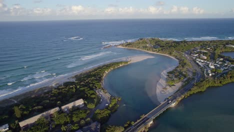 aerial view of tweed coast road crossing cudgera creek in hastings point, new south wales, australia