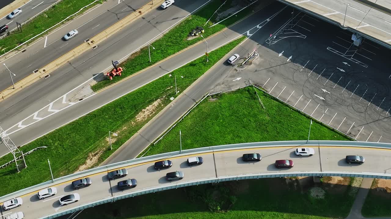 Traffic flows smoothly on elevated road in New York during sunny day