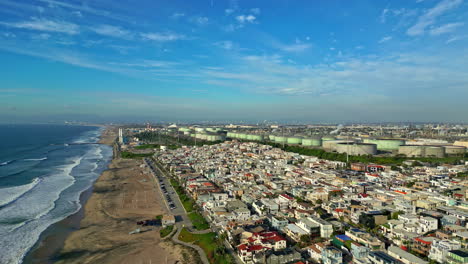 Aerial-view-around-the-El-Segundo-industrial-area-neighborhood,-in-sunny-LA,-USA