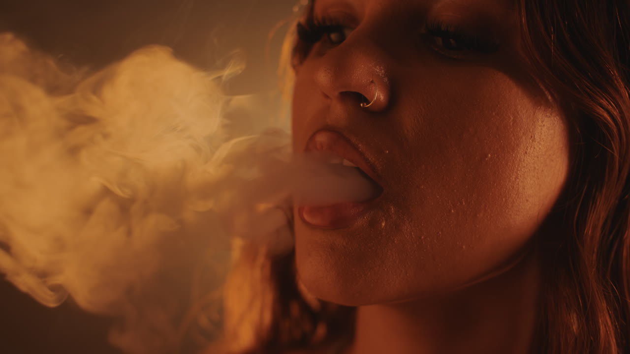 Gen Z Woman Blowing Smoke from Mouth