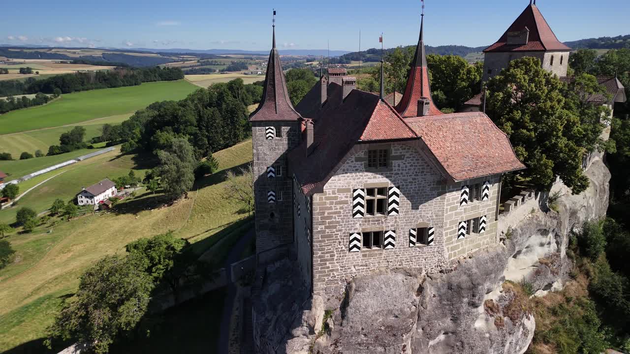 Rue Switzerland medieval castle building Europe smallest town aerial drone