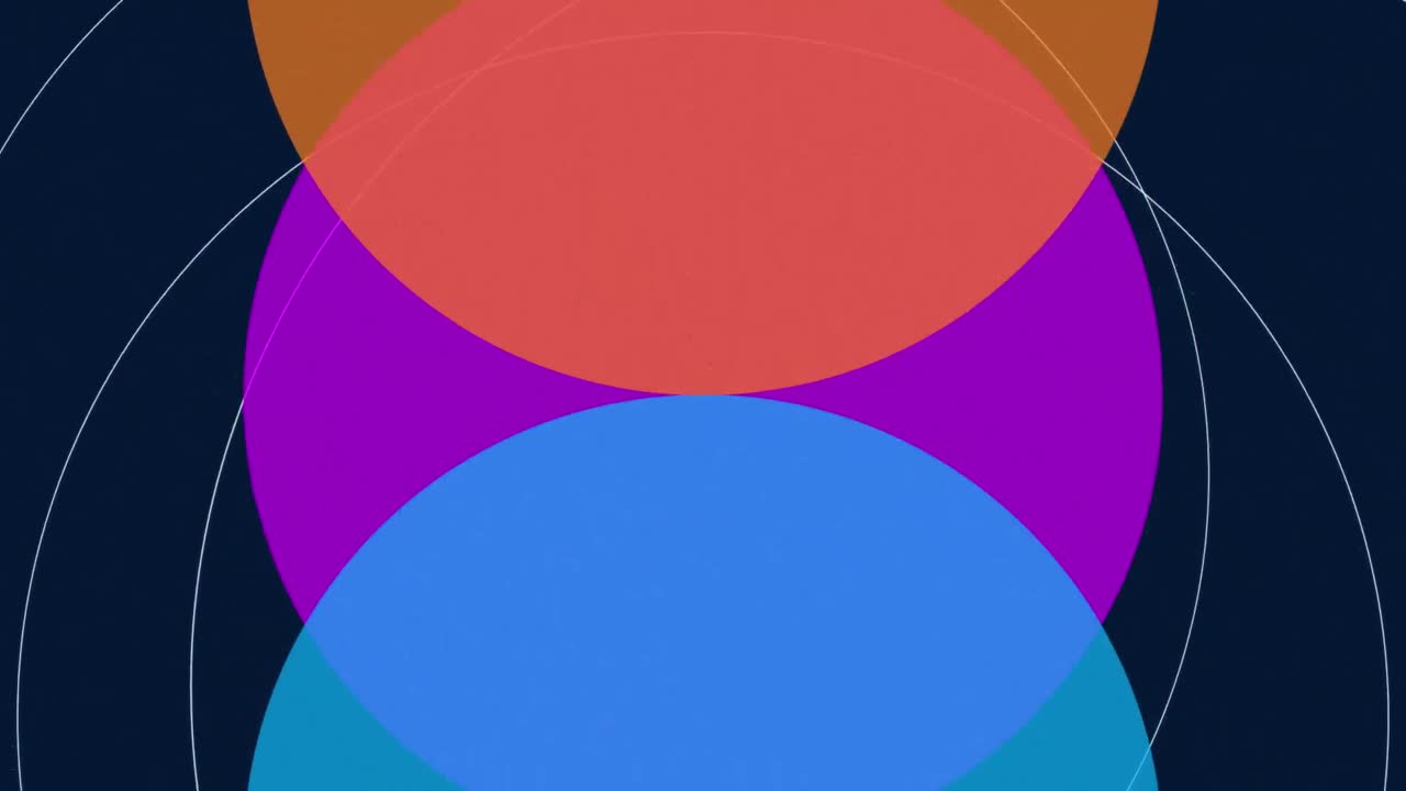 animación de círculos translúcidos azules, púrpuras y naranjas superpuestos que se mueven en negro