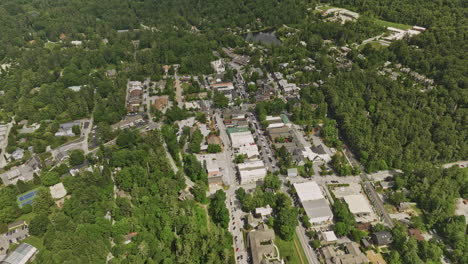 highlands north carolina aerial v5 birds eye view drone flyover town center above main street, elevation up capturing clouds and rolling mountain landscape views - shot with mavic 3 cine - july 2022