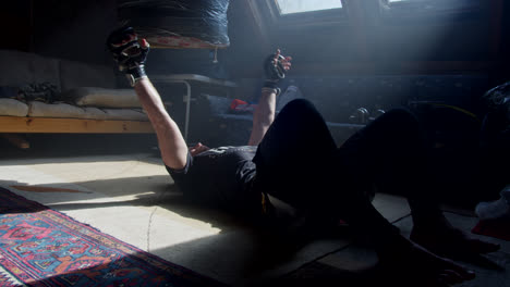 man doing mma workout at home
