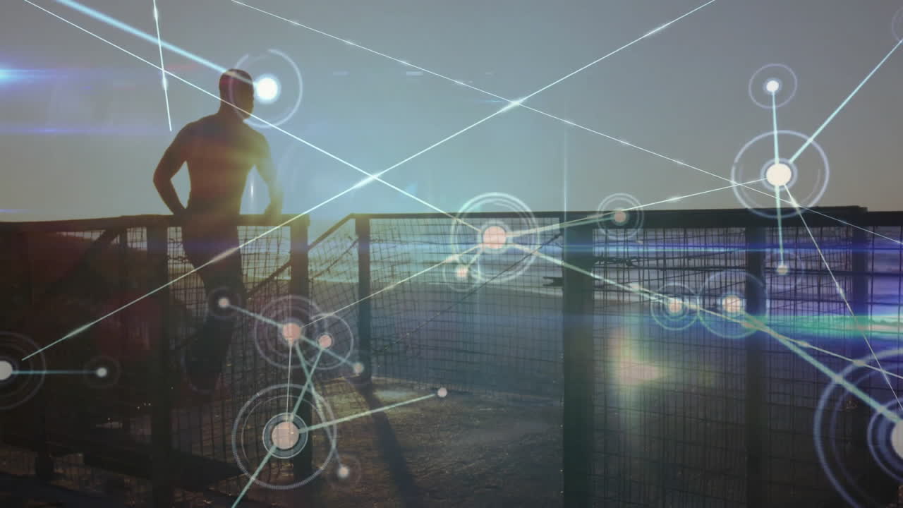 Man leaning against pier railing at sunset, showing digital network lines and nodes for technology