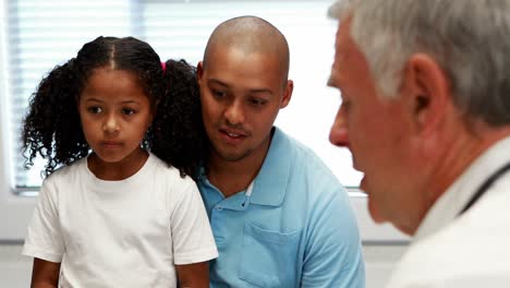 Male-doctor-and-patient-interacting-with-each-other