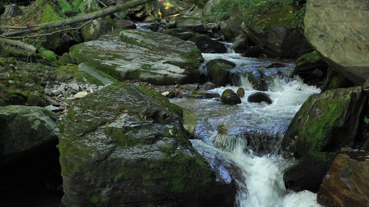 Mountain river flowing over rocks and boulders in forest, Bistriski Vintgar gorge on Pohorje mountain, Slovenia, hiking and outdoor tourism landmark, ecology clean water concept, natural resources