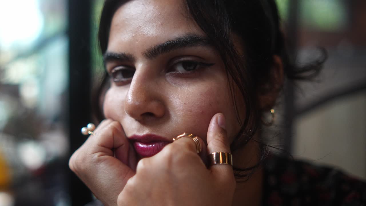 Close-up portrait of a woman with jewelry