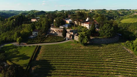surrounded by scenic vineyards, a charming wedding venue in piedmont, italy, under clear skies