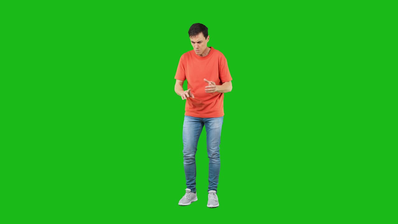 Young man counting on fingers with a confused expression on green screen