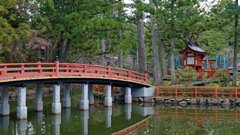 a cinematic view of a traditional bridge located within the sacred temple grounds of danjo garan in mount koya, koyasan, japan.