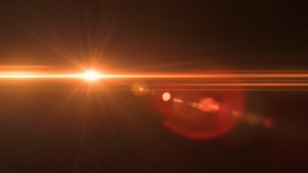 Bright Orange Light Flare Shifting Across Black Screen