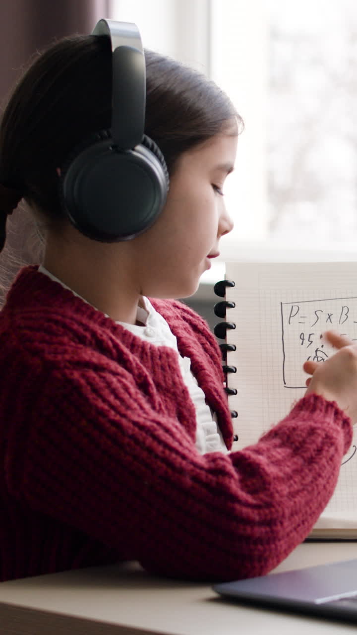 Young girl studying math