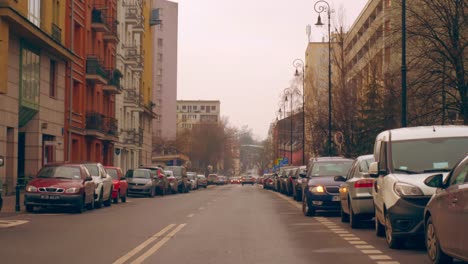 parked cars along the road in the old town