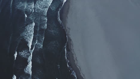 dark beach aerial view