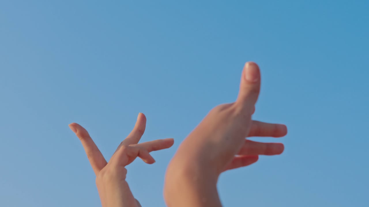 Woman's hand reaching out