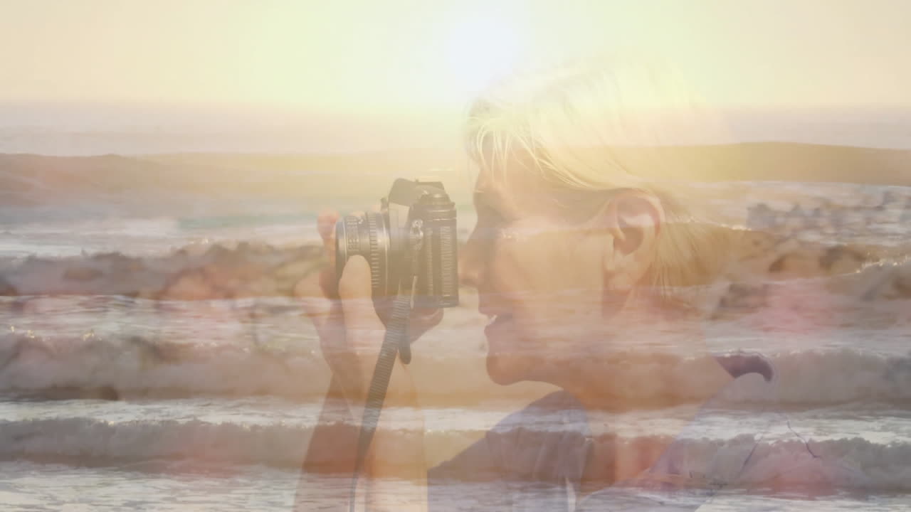 woman capturing sunset seascape on camera, overlaying golden wave animation for travel marketing