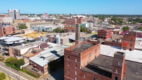 aerial over mixed use industrial district of memphis tennessee with apartments condos and converted old warehouses 1