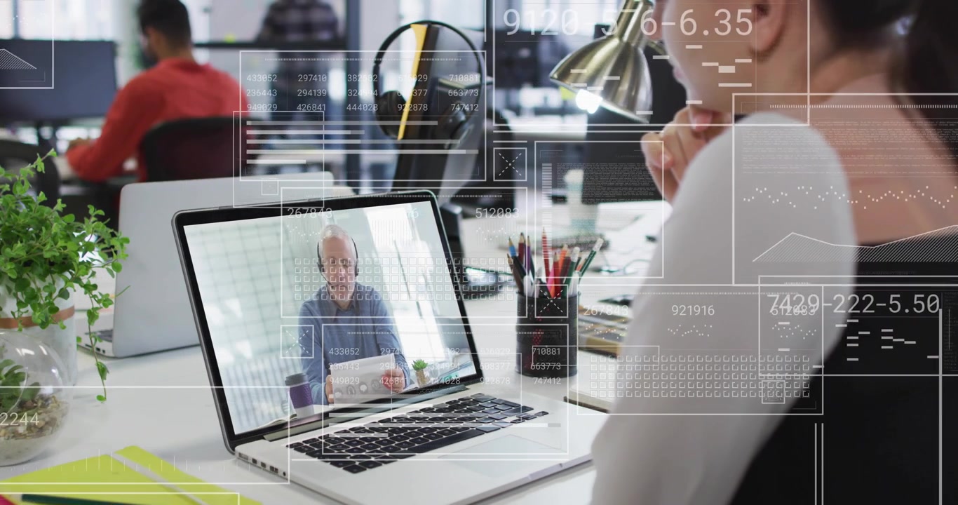 Woman watching while remote host reading papers and driving HUD around laptop for business call