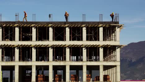 construction workers on a high-rise building