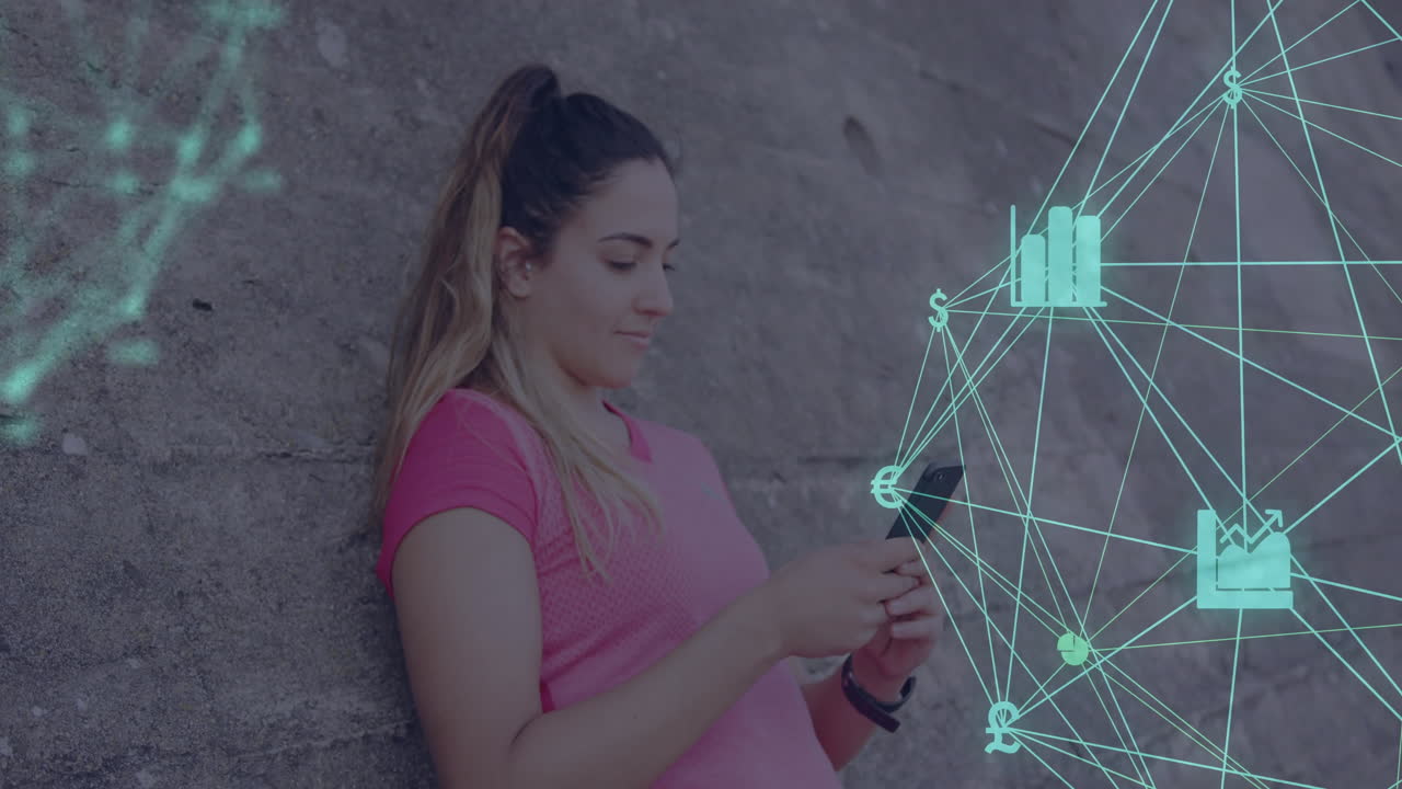 woman leaning against stone wall using smartphone, showing finance overlay with currency icons