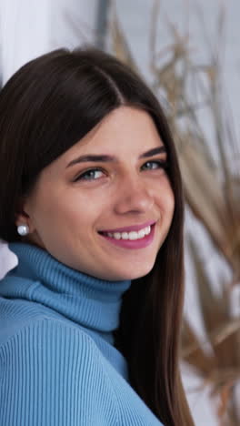 positive attractive young woman. pretty young female model posing. vertical video