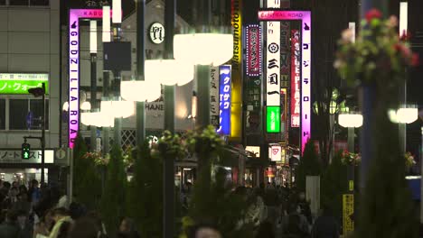 illuminated signs on busy tokyo street