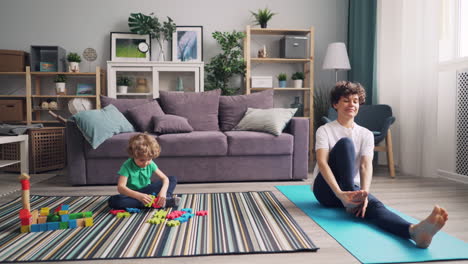 mother and son relaxing and playing at home