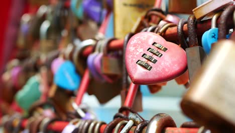 Hanging-pink-heart-shape-padlock-,