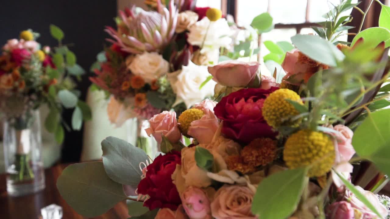 Macro Of Colorful Bouquet Of Flowers Display On A Table